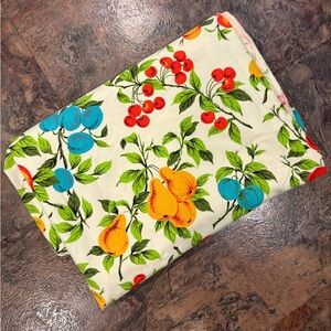 vintage-style fruit and floral patterned tablecloth oval